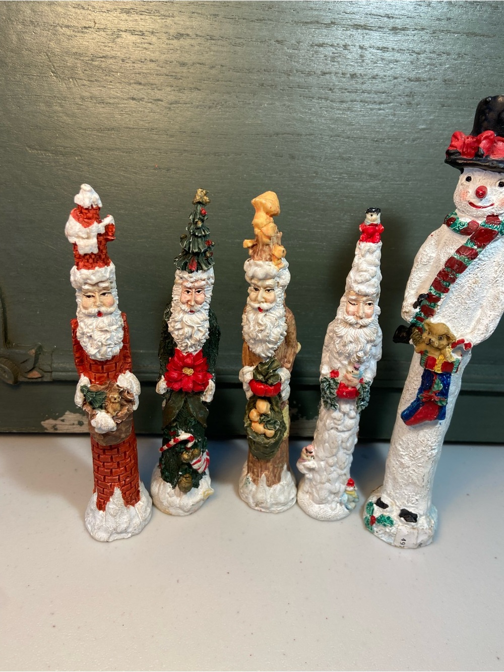 Vintage Set of 4 pencil Santa Figurine and Snowmen Holiday Home Décor